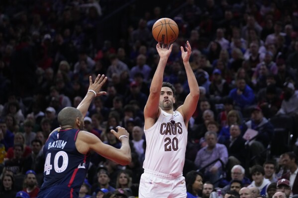 Garland leads shorthanded Cavaliers to 122 119 win over 76ers in
